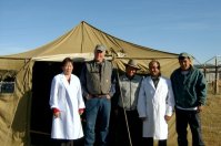 Kent Madin with Dr. Purevsuren and other staff in front of the ger clinic tent i n Renchinlhumbe